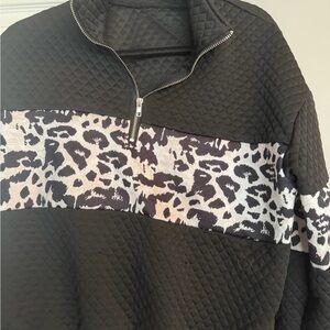 Black Quilted Pullover with Animal Print
